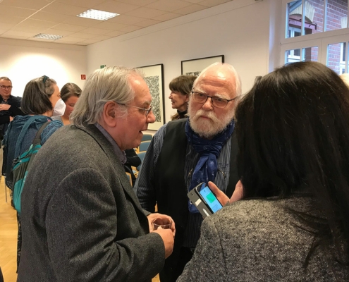Neujahrsempfang der Leipziger Grafikbörse - anregendes Gespräch zwischen Manfred Jendryschik und dem Drucker Reinhard Rössler